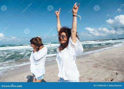 Two Friends Walking on the Beach Stock Image - Image of stylish, enjoy: 112965163