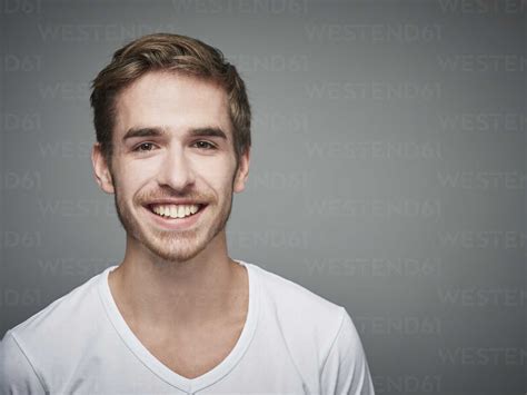 Portrait of smiling young man stock photo