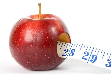 Apple and Tape Measure Dieting Concept