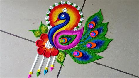 Bright and stunning peacock rangoli | Unique free hand peacock kolam for festivals - YouTube
