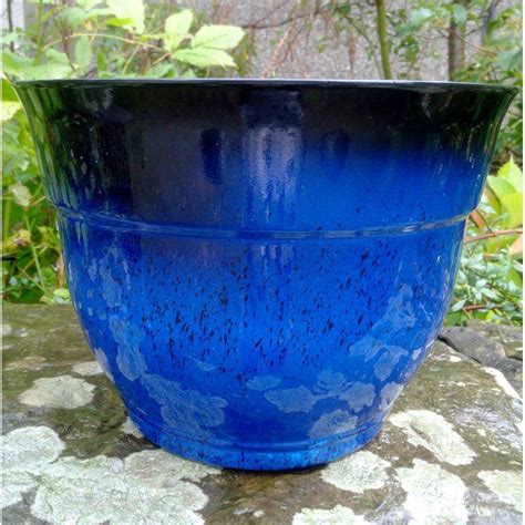 Firenze Plastic Plant Pot | Plastic plant pots, Wooden planters, Plastic barrel planter