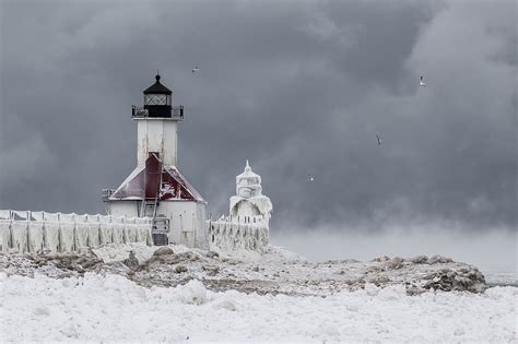 SOUTH HAVEN, MI - JANUARY 8: St Joseph's Lighthouse above a frozen lake, in South Haven ...