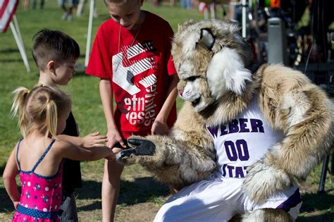 Children greet a Weber State University mascot during - NARA & DVIDS Public Domain Archive ...