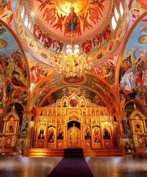 An Eastern Rite church with its ornate iconostasis. An iconostasis is a ...