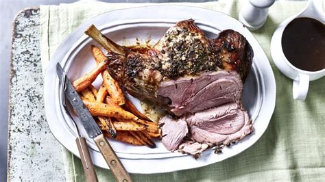 Roast leg of lamb with garlic and rosemary recipe - BBC Food