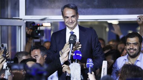 Greek PM's party wins election, but short of majority