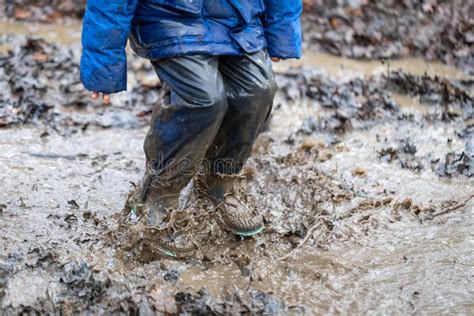 Young Children Playing in a Mud Puddle Stock Image - Image of girl, children: 168653201