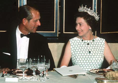 Queen Elizabeth II and Prince Philip smiled at each other at a state ...