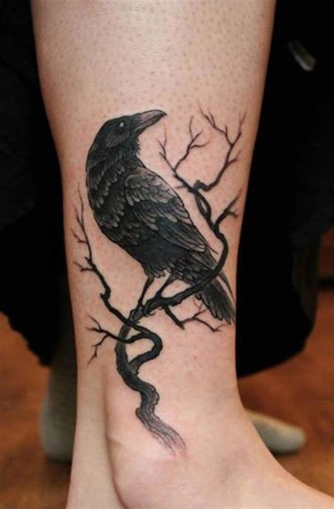 Old school style black ink crow tattoo on ankle - Tattooimages.biz