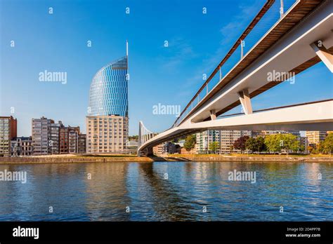 Modern bridge crossing Meuse River in Liège Belgium Stock Photo - Alamy