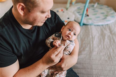 A Father Carrying His Baby · Free Stock Photo