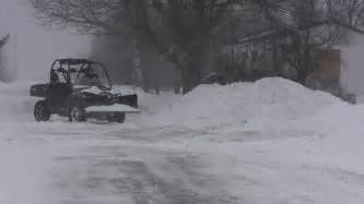 SPRINGHILL, NOVA SCOTIA, CANADA - FEBRUARY 9 2013 - Snow Plow Turning On To Rural Highway Taking ...