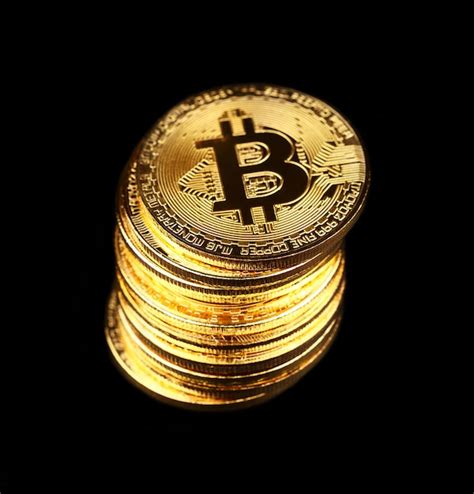 Premium Photo | Gold bitcoin physical coins isolated on black