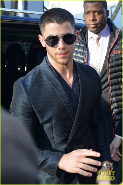 Nick Jonas Suits Up & Makes Us Swoon at Emporio Armani's Milan Fashion ...