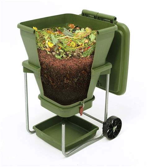 A side angle of the Hungry Bin worm composter with the inside of the ...