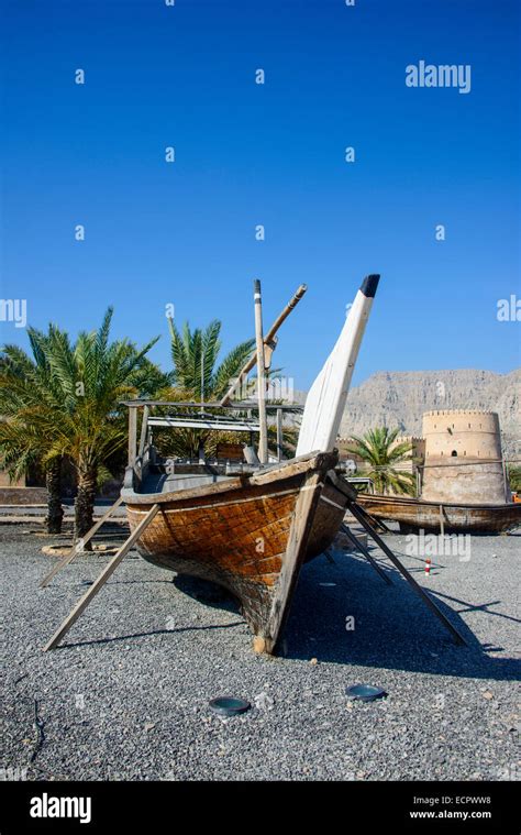 Old dhow in front of Khasab fort, Khasab, Musandam, Oman Stock Photo ...