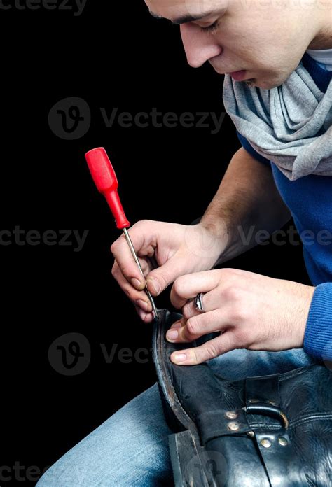 Shoes repair process 857033 Stock Photo at Vecteezy