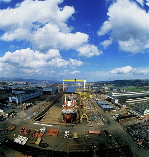 Aerial View Of A Shipyard, Harland And Wolff, Belfast, Northern Ireland - Stock Photo - Dissolve