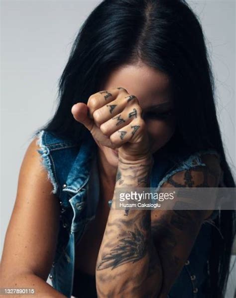 Fist Tattoos Photos and Premium High Res Pictures - Getty Images