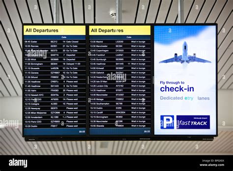 Departure board at Edinburgh airport, Scotland Stock Photo - Alamy