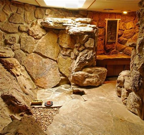 Years ago I saw photos of this really kewel stone cave bathroom with a ...