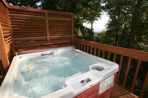 Gatlinburg cabins, chalets and condos | Chalets in gatlinburg, Gatlinburg cabins, Hot tub