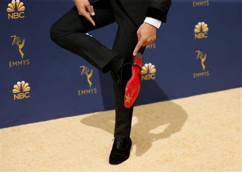 Trevor Noah Gets a Sticker Stuck on His Louboutins at the Emmy Awards ...