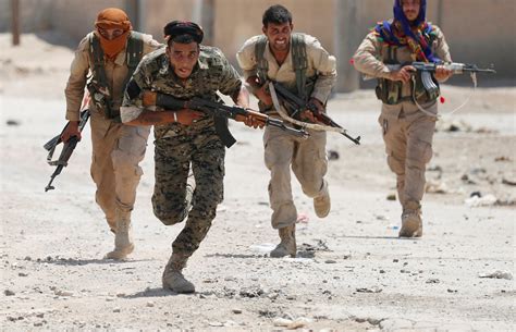 War in Syria: U.S.-Backed Forces Fighting ISIS Breach Raqqa's Old City Wall - Newsweek