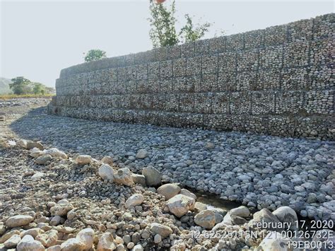 Wall built along Anahawin River in Calintaan, Occidental Mindoro ...