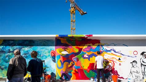 Photos: Local artists paint a temporary mural on 5th Avenue South