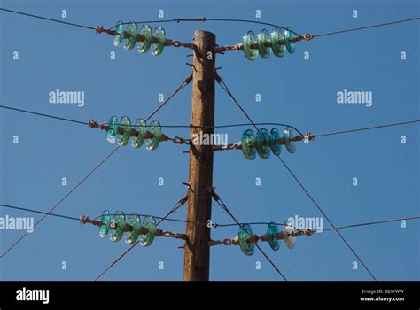 glass insulators on electrical power lines in Baja California, mexico Stock Photo - Alamy