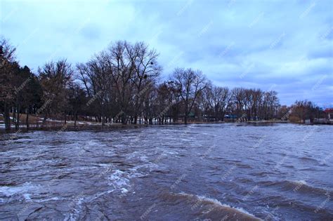 Premium Photo | Flooding of river in spring in town during melting of ...