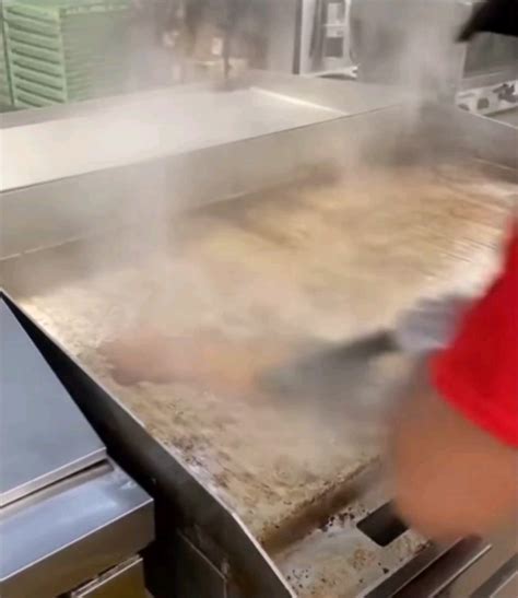 Cleaning the flat top grill. : r/oddlysatisfying