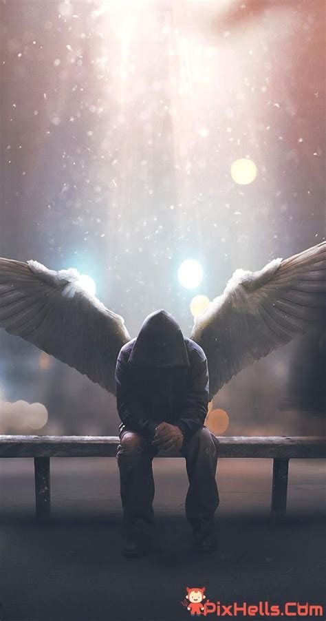 a person sitting on a bench with wings outstretched