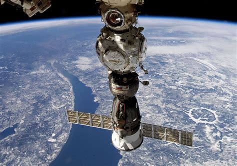 ISS crew to inspect Soyuz space capsule leak with robotic arm | Daily Sabah