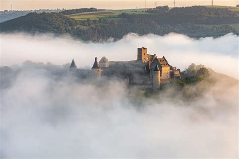 Bourscheid Castle in Luxembourg in fog - Photographer Luxembourg