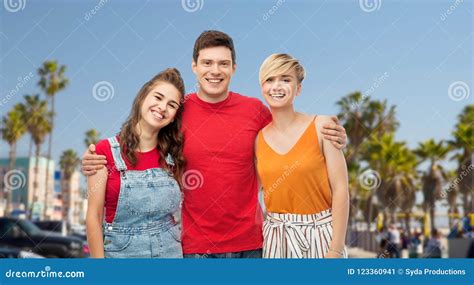 Happy friends hugging stock image. Image of person, group - 123360941