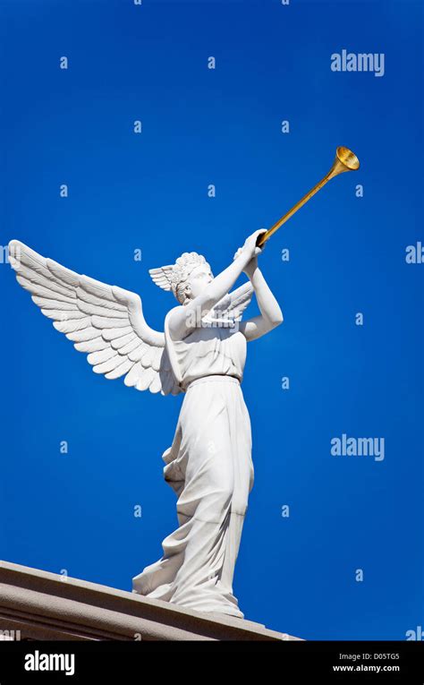 Statue of an Angel Blowing a Trumpet Stock Photo, Royalty Free Image: 51760133 - Alamy