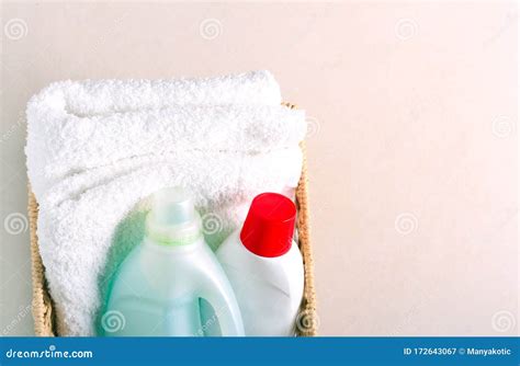 Towels and fabric softener stock image. Image of softener - 172643067