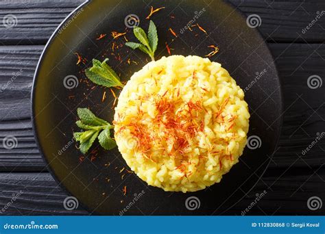 Risotto from Rice Carnaroli with Saffron and Mint Closeup. Horizontal Top View from Above Stock ...