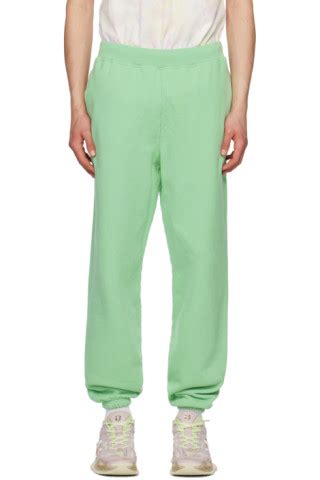 Aries: Green Premium Temple Sweatpants | SSENSE