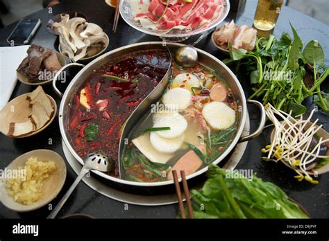 Chongqing hot-pot in a restaurant Stock Photo - Alamy