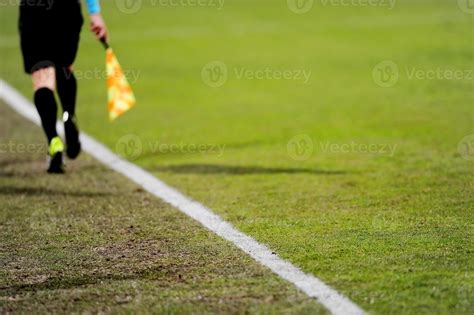 Assistant referee in action 897471 Stock Photo at Vecteezy