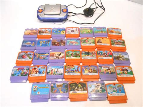 VTech VSmile Cyber Pocket Learning System with A Huge Lot of Games ...