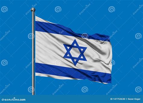 Flag of Israel Waving in the Wind Against Deep Blue Sky. Israeli Flag ...