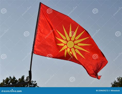 View of the Macedonian Flag on a Blue Sky Background Stock Photo ...