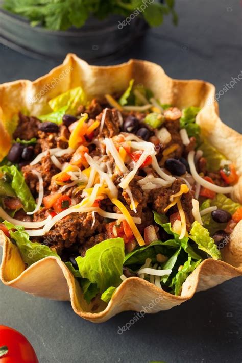 Taco Salad in a Tortilla Bowl — Stock Photo © bhofack2 #98231540