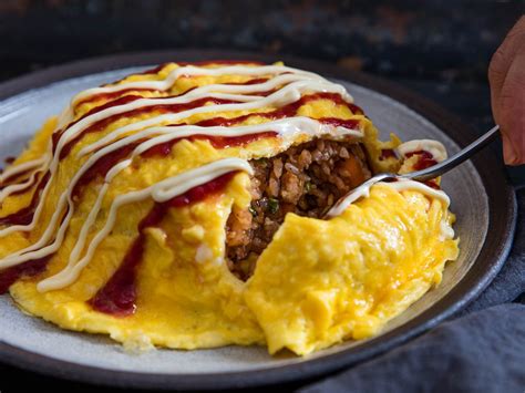 Japan's omurice, which also goes by the names omumeshi and omuraisu, is an addictive dish of ...