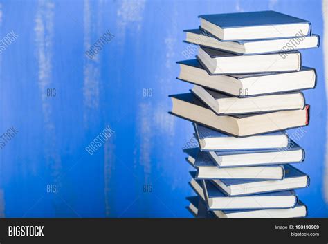 Stack Books On Blue Image & Photo (Free Trial) | Bigstock