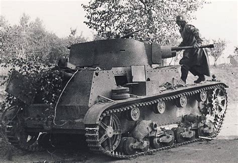 7TP | German soldier inspecting abandoned 7TP tank near Budz… | Flickr